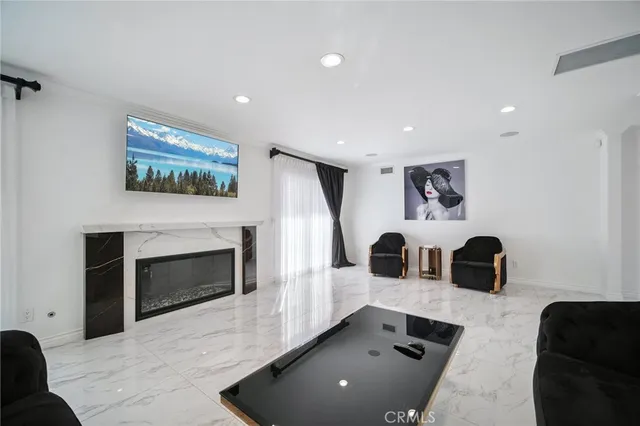 a bathroom with a sink mirror and toilet