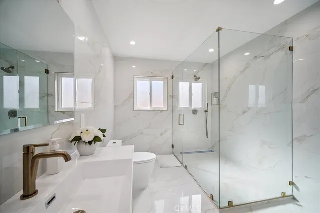 an empty room with a empty space and windows