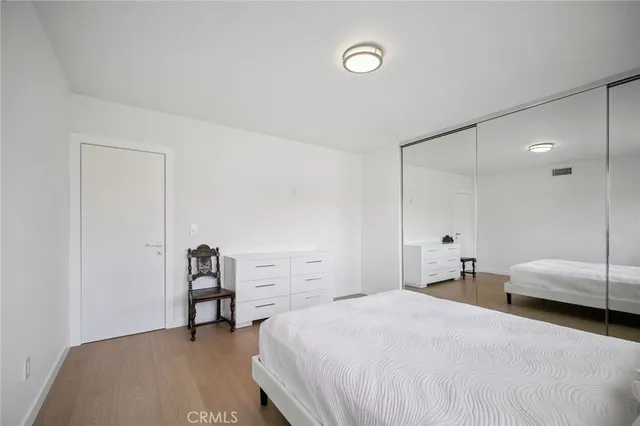 wooden floor in an empty room with wooden floor and windows