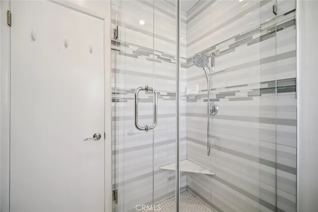 a bathroom with a bathtub and a toilet