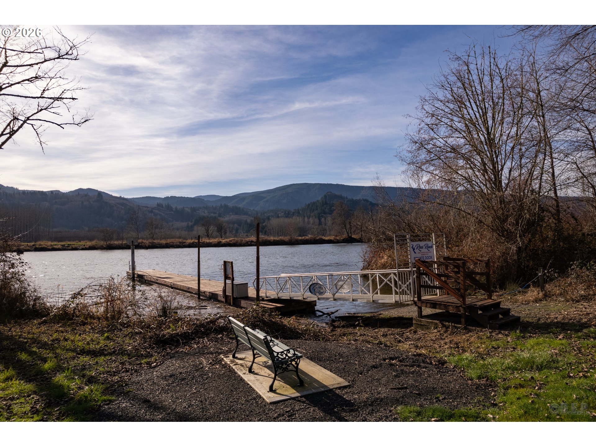 0 Columbia River Road Clatskanie, OR 97016 - Photo 8 of 12 a view of a lake with houses in back