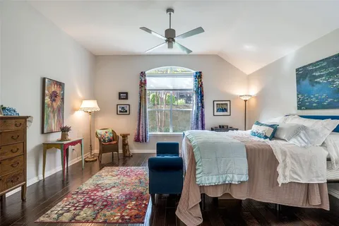 a bed room with furniture and a window