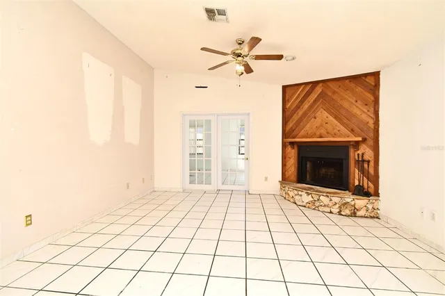 a view of an empty room and window