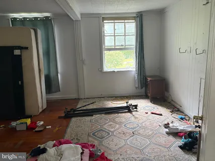 a room with furniture and a window