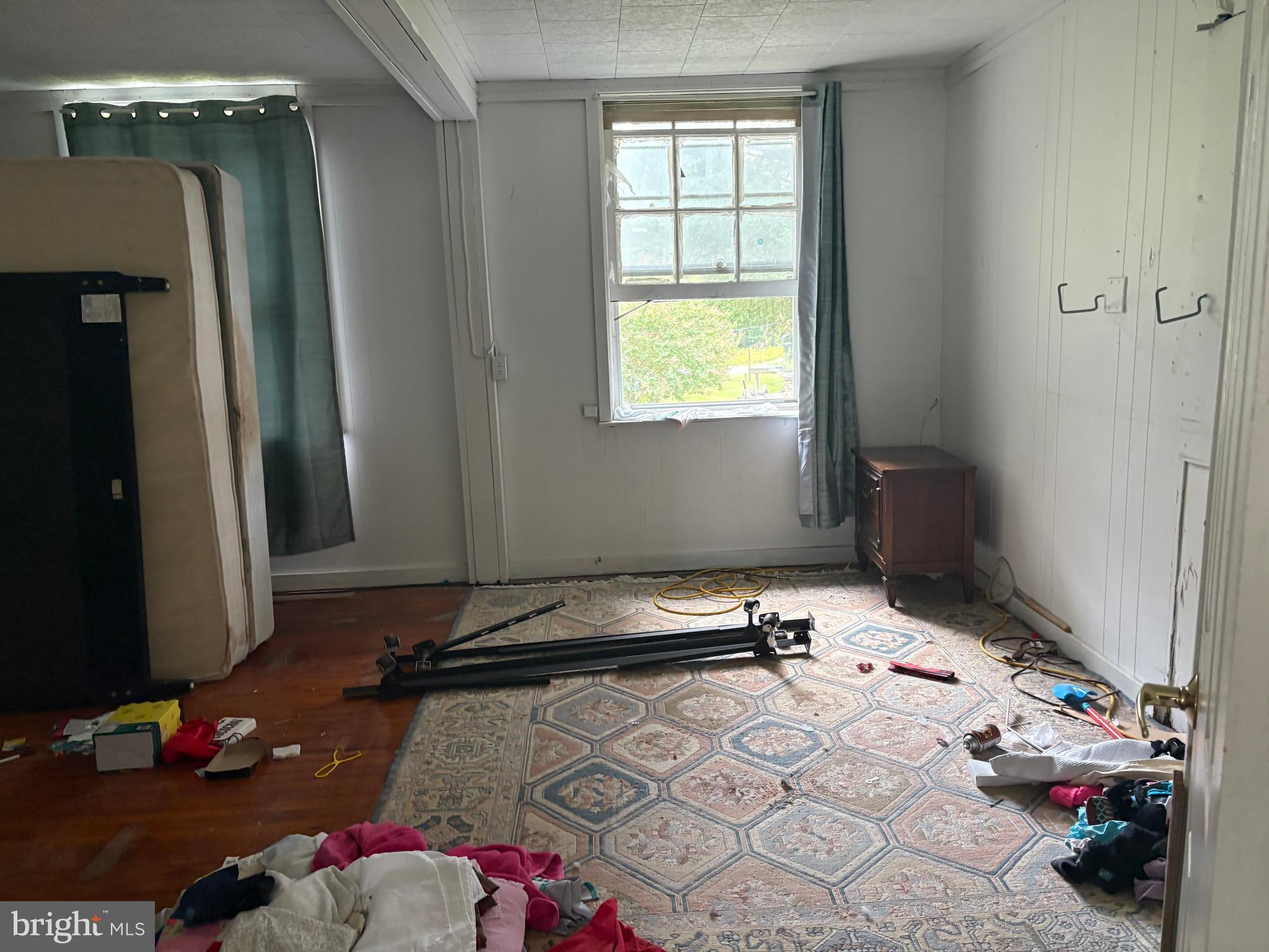 309 South Main Street Hurlock, MD 21643 - Photo 26 of 53 a bedroom with a bed and a window