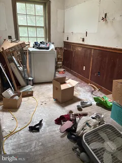 a room with windows and tub