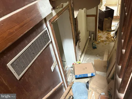 a view of living room with furniture and a window