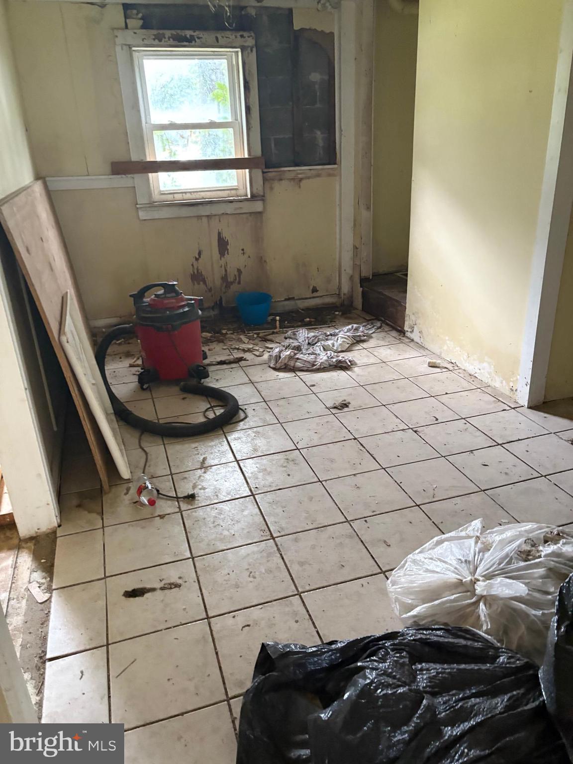 309 South Main Street Hurlock, MD 21643 - Photo 44 of 53 a bedroom with a bed and a window