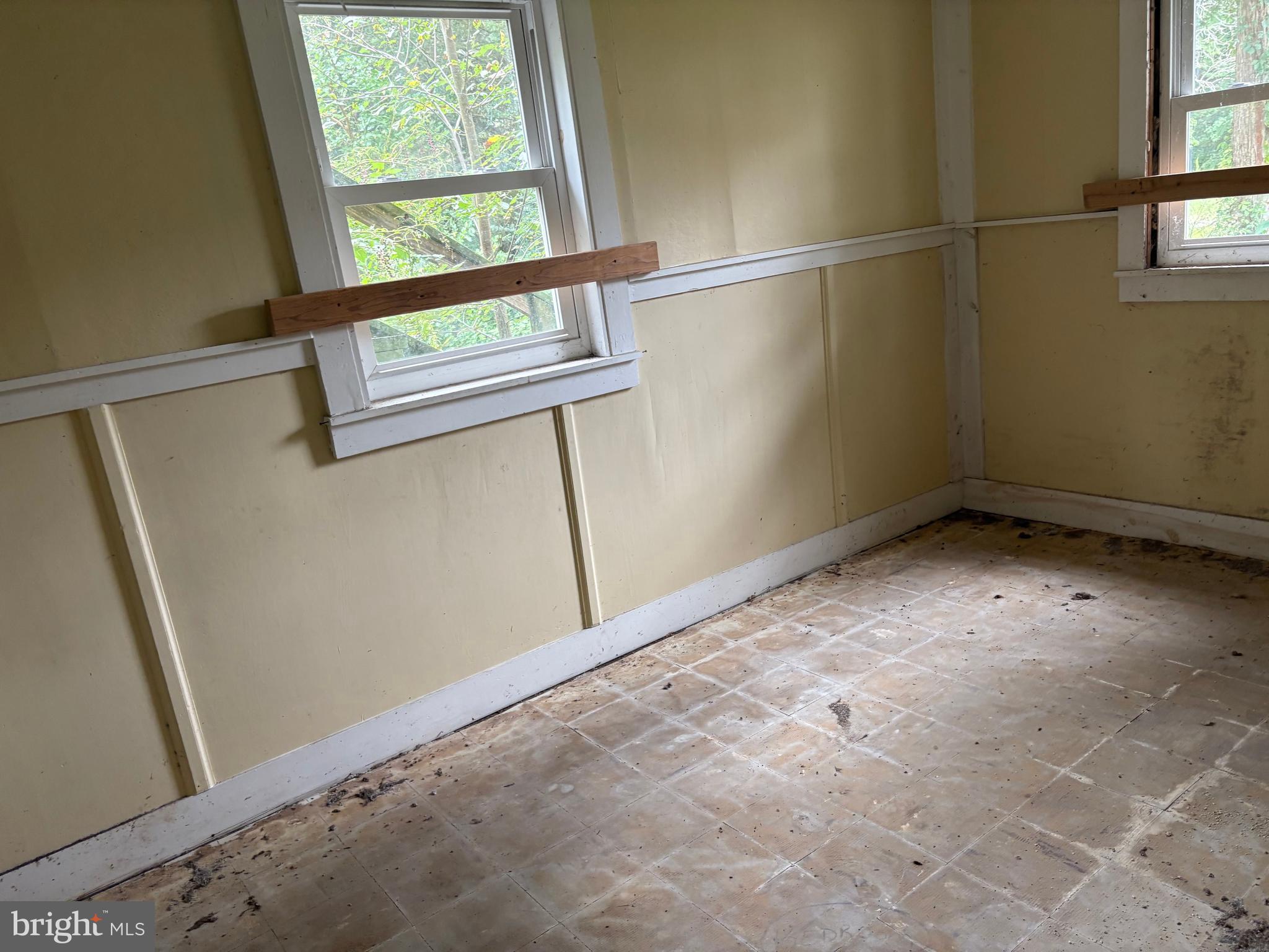309 South Main Street Hurlock, MD 21643 - Photo 48 of 53 a view of empty room with windows