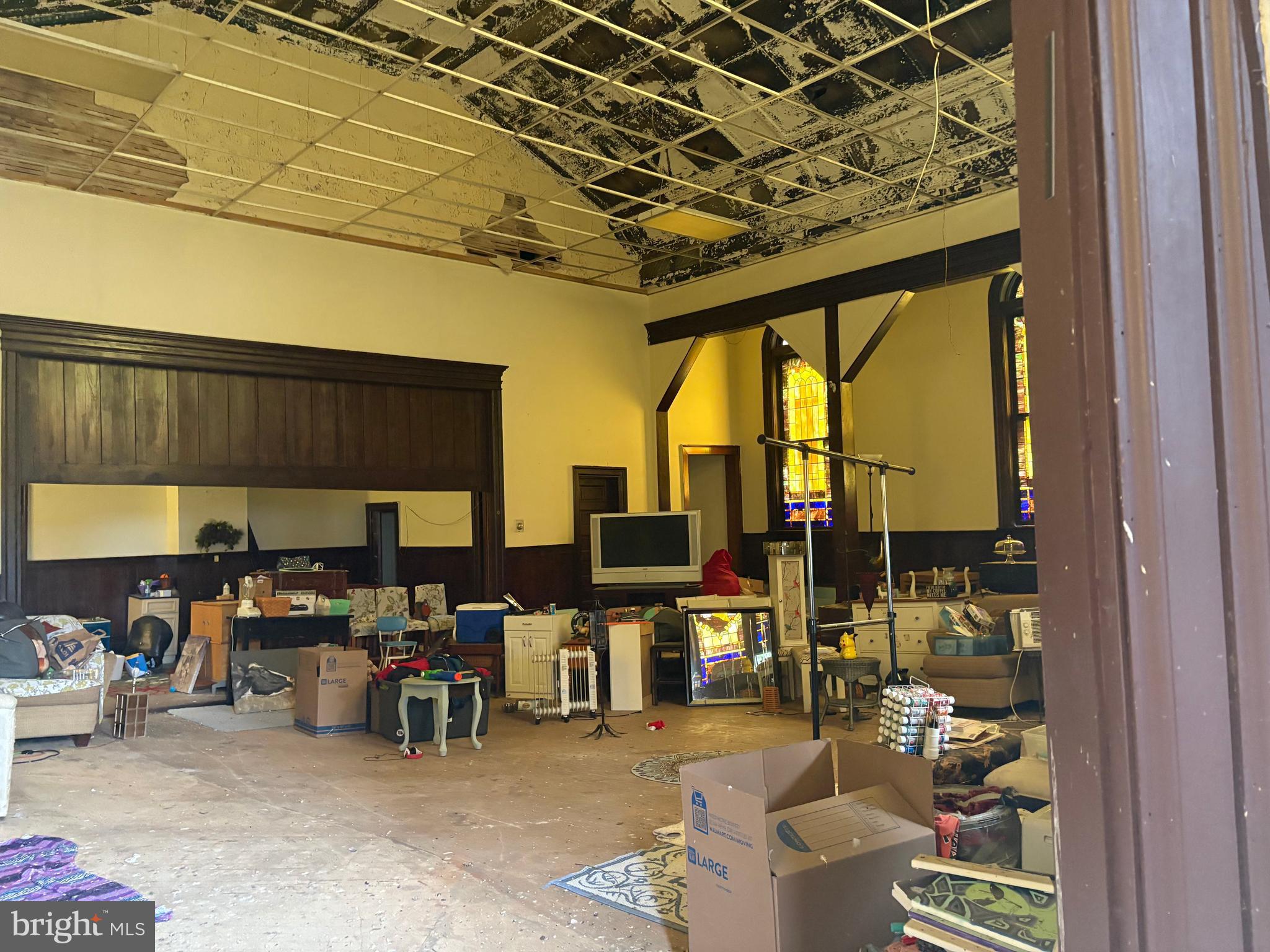 309 South Main Street Hurlock, MD 21643 - Photo 6 of 53 a room with lots of furniture and clutter