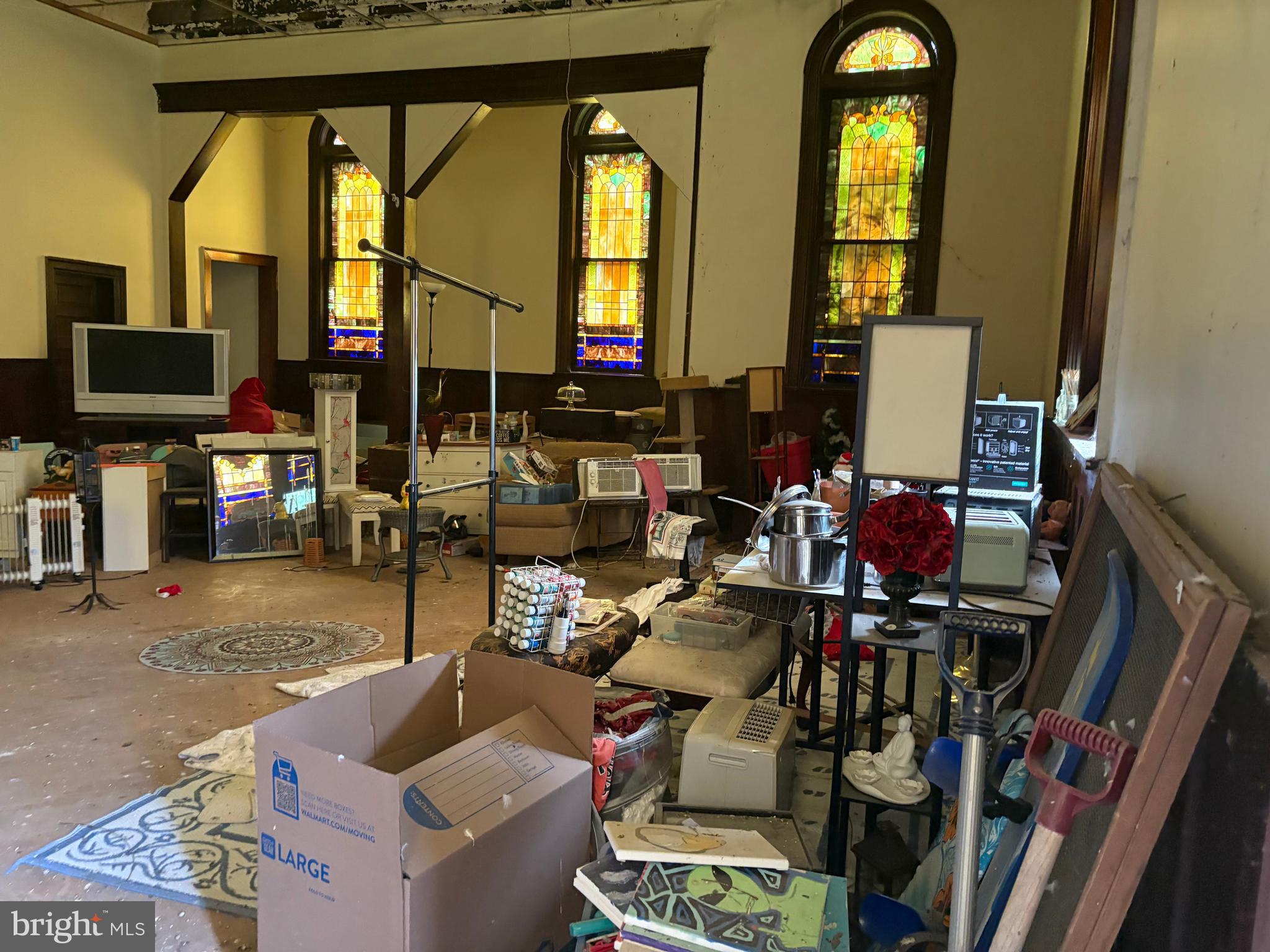 309 South Main Street Hurlock, MD 21643 - Photo 8 of 53 a living room with furniture and a fireplace