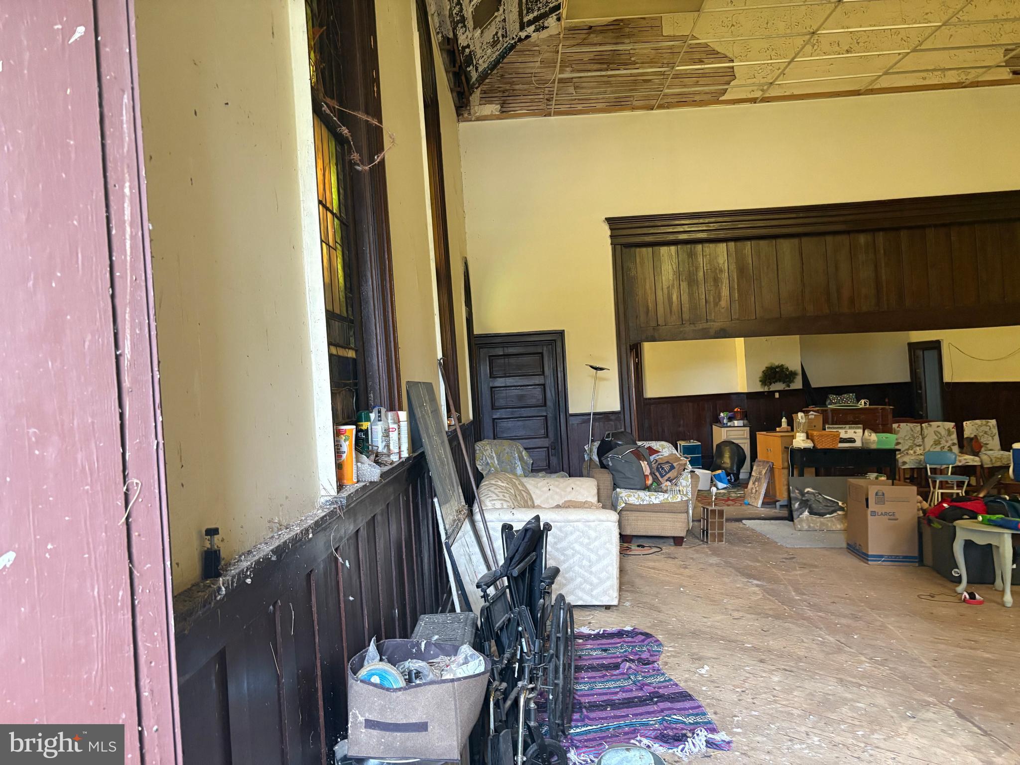 309 South Main Street Hurlock, MD 21643 - Photo 9 of 53 a living room with furniture and a floor to ceiling window
