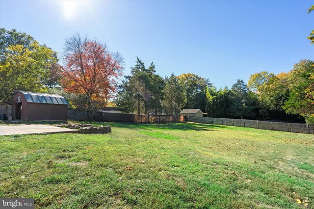 a view of a backyard with a garden