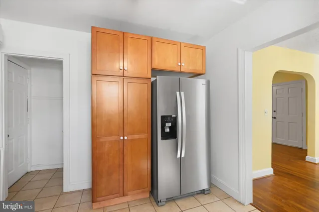 a view of front door with wooden floor