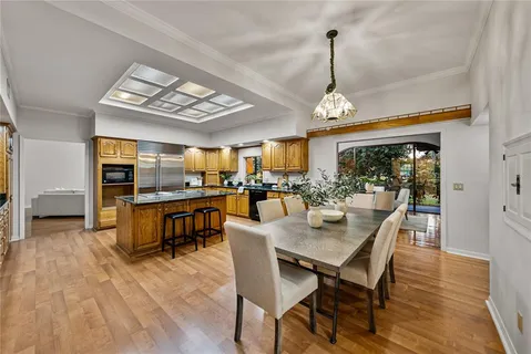 a bedroom with a large bed and a dresser