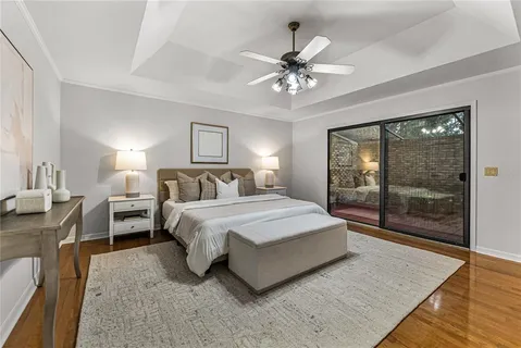 a spacious bathroom with a double vanity sink a mirror and a bathtub