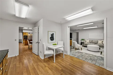 a living room with furniture and a table