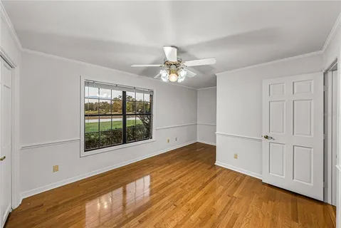 an aerial view of a house with garden space and sitting area