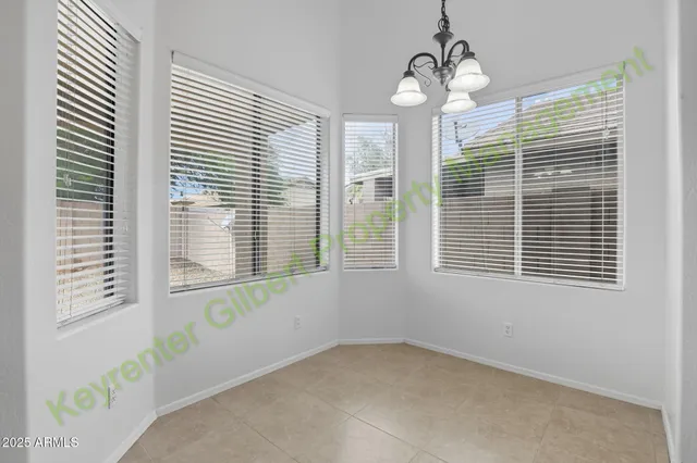 a picture of a bathroom with a shower