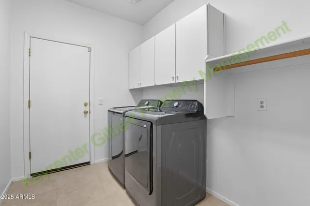 a kitchen with stainless steel appliances granite countertop a stove and a microwave