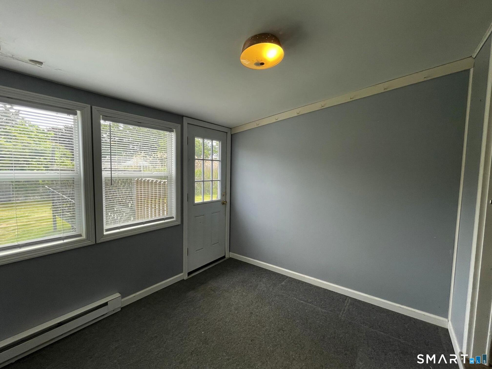 18 Old South Cove Road Old Saybrook, CT 06475 - Photo 21 of 40 an empty room with windows
