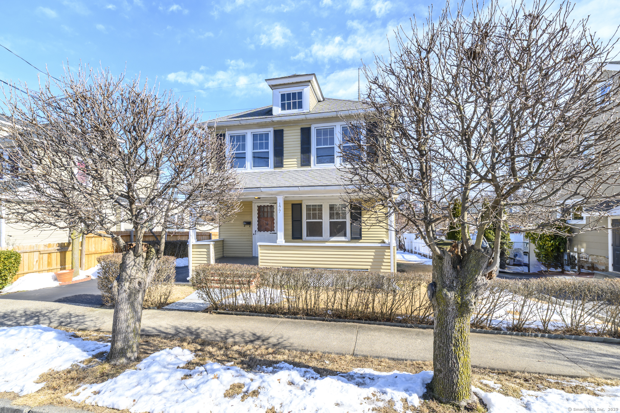 177 Culloden Road Stamford, CT 06902 - Photo 1 of 1 a front view of a house with a yard