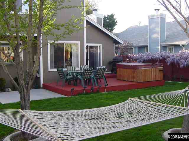 2742 Azuza Way Reno, NV 89502 - Photo 2 of 9 a front view of house with yard and outdoor seating