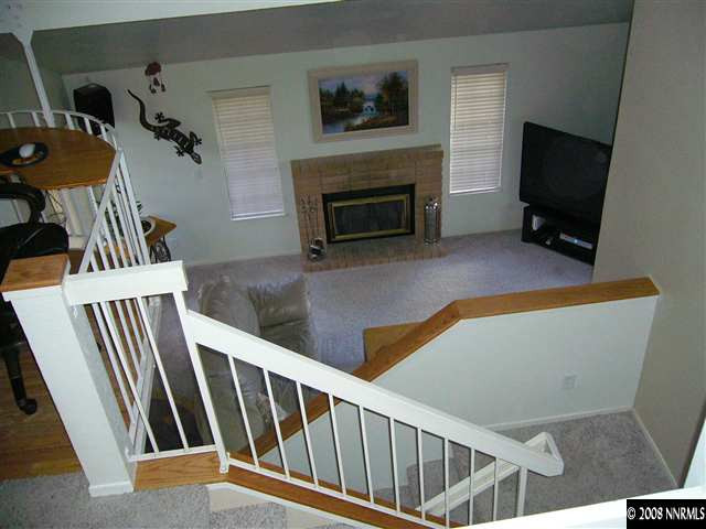 2742 Azuza Way Reno, NV 89502 - Photo 3 of 9 a view of livingroom with furniture and a fireplace