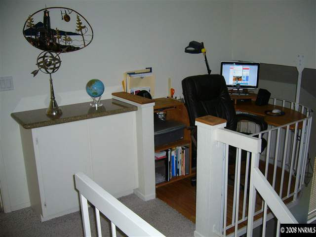 2742 Azuza Way Reno, NV 89502 - Photo 8 of 9 a view of a workspace with furniture