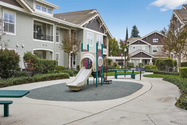 a view of a house with a park