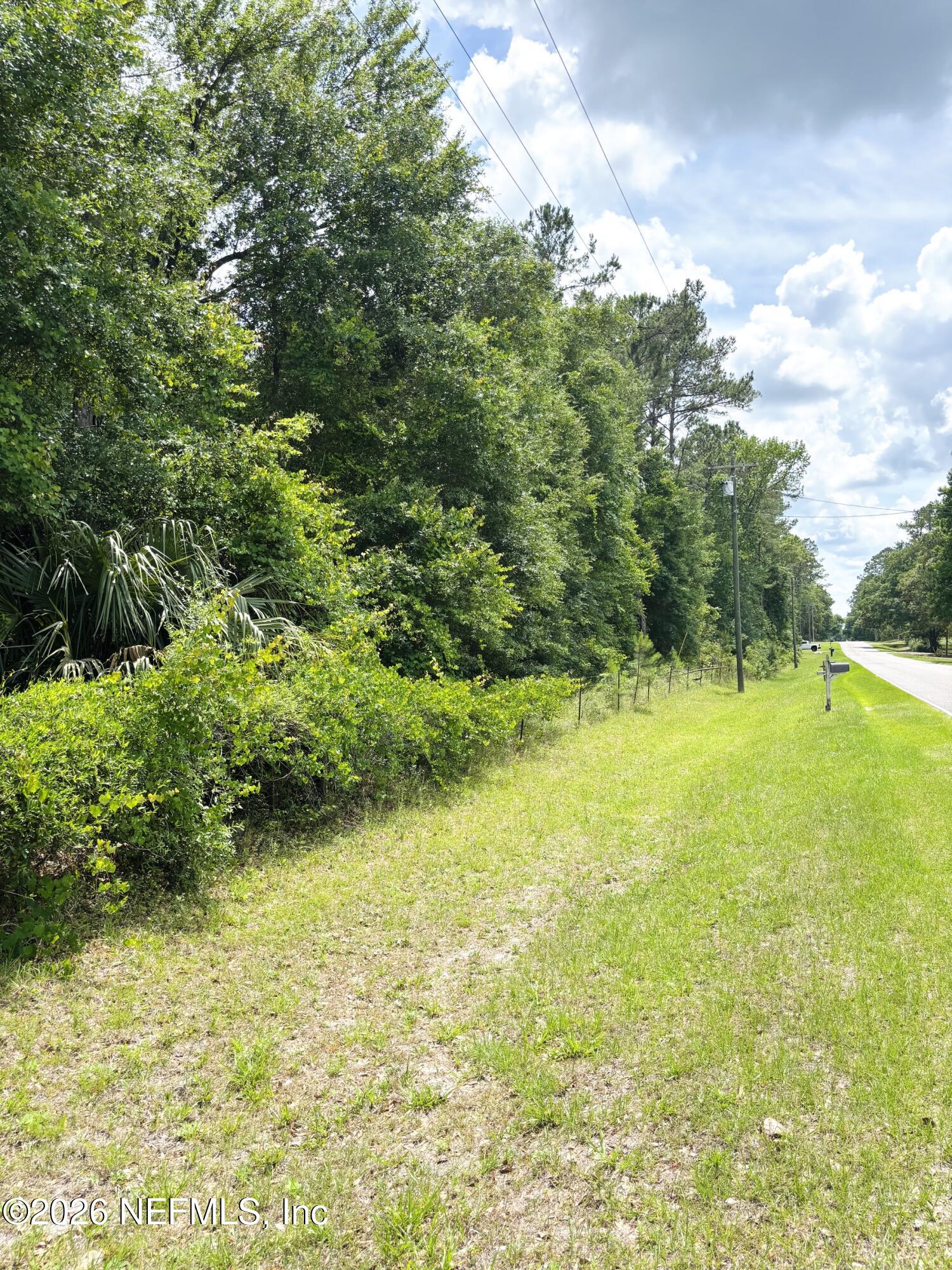 0 Lake Hampton Road Hilliard, FL 32046 - Photo 20 of 23 a view of yard with swimming pool