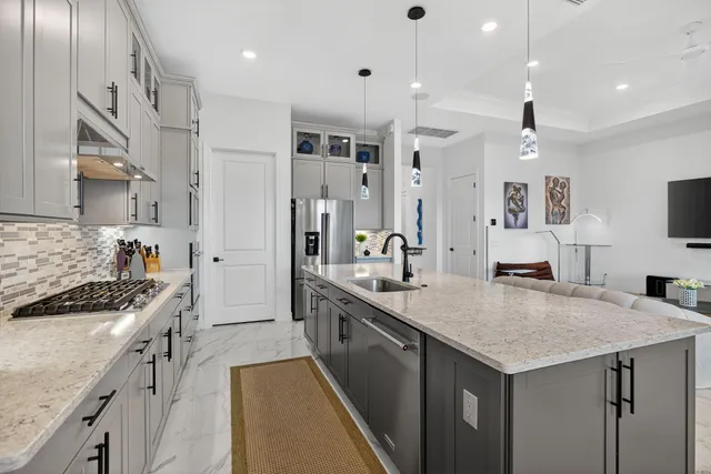 a bedroom with a bed and a flat screen television