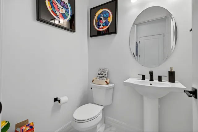 a view of swimming pool in front of the house