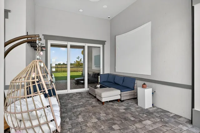 a view of a lake with houses in the back