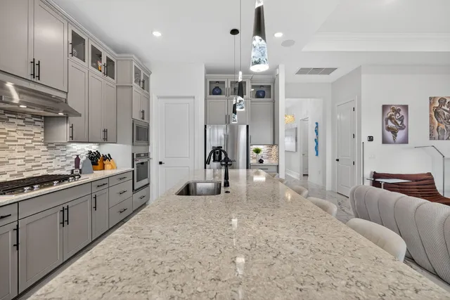 a bedroom with a bed and dresser