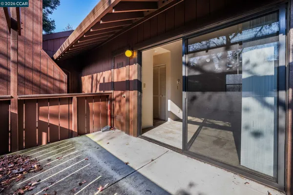 a view of a house with a tree