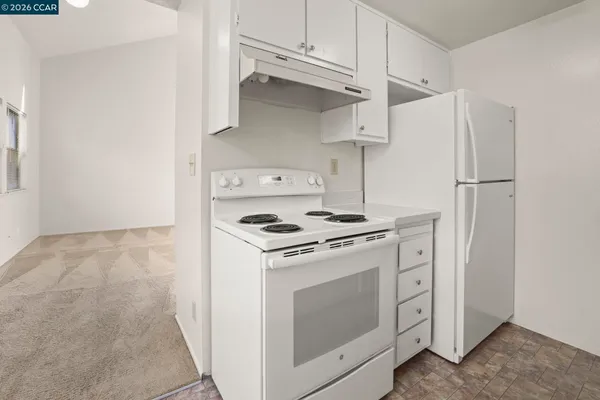 a view of a bathroom from a hallway