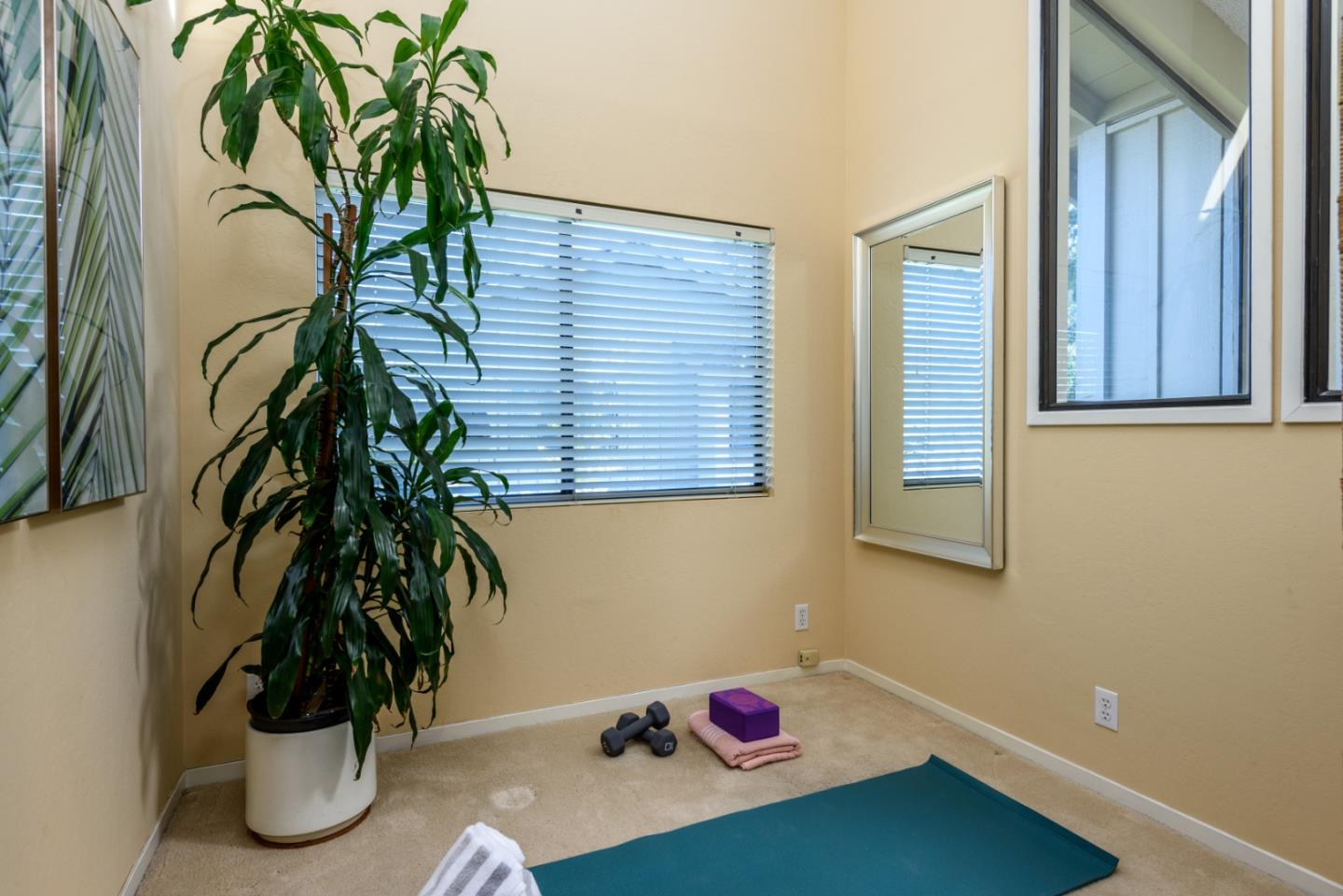 420 Sand Hill Circle Menlo Park, CA 94025 - Photo 13 of 29 a vase of flowers sitting next to a window