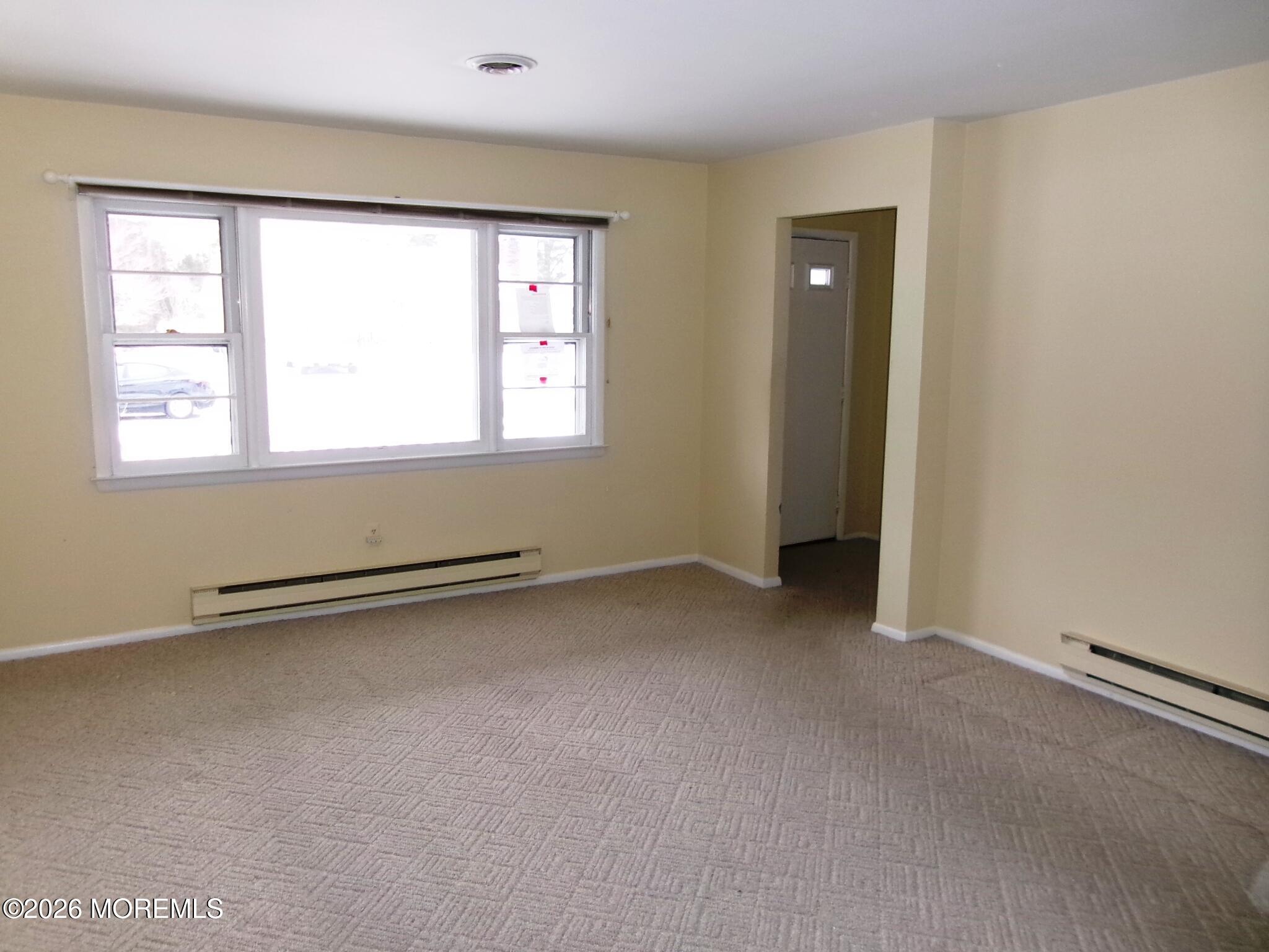 63 Eton Road Toms River, NJ 08757 - Photo 14 of 23 an empty room with a window