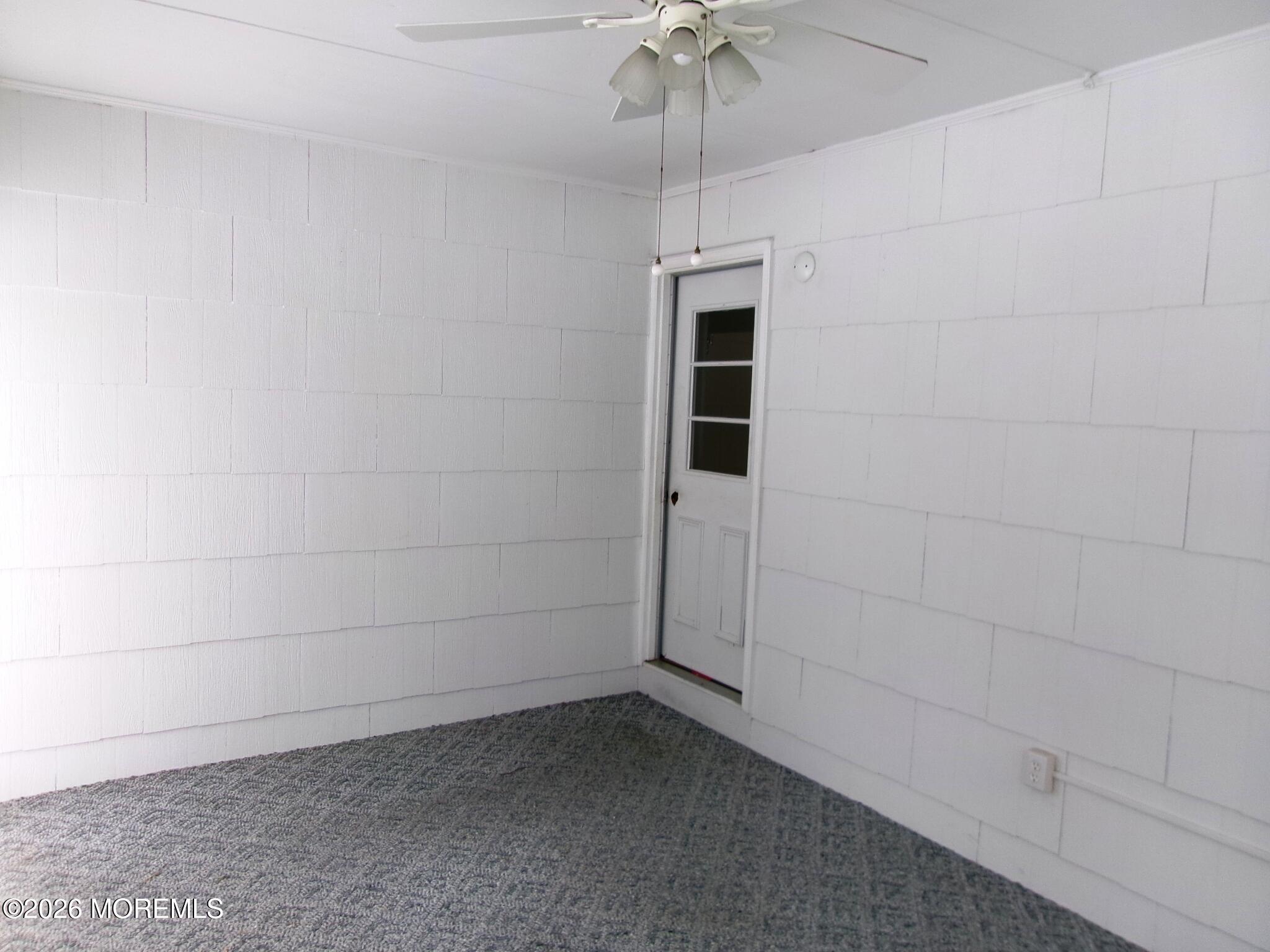63 Eton Road Toms River, NJ 08757 - Photo 15 of 23 a view of empty room with a ceiling fan