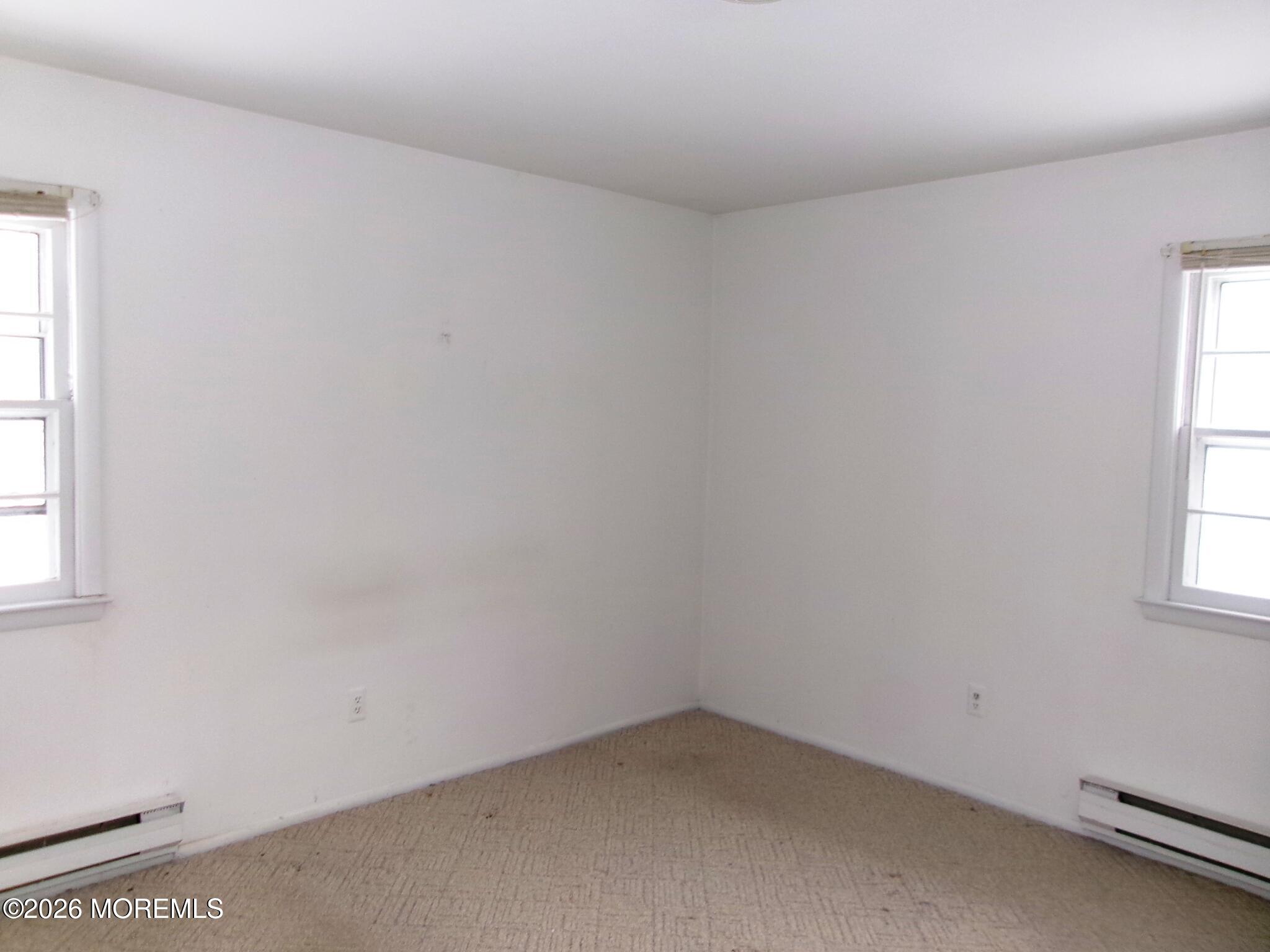63 Eton Road Toms River, NJ 08757 - Photo 17 of 23 an empty room with a window