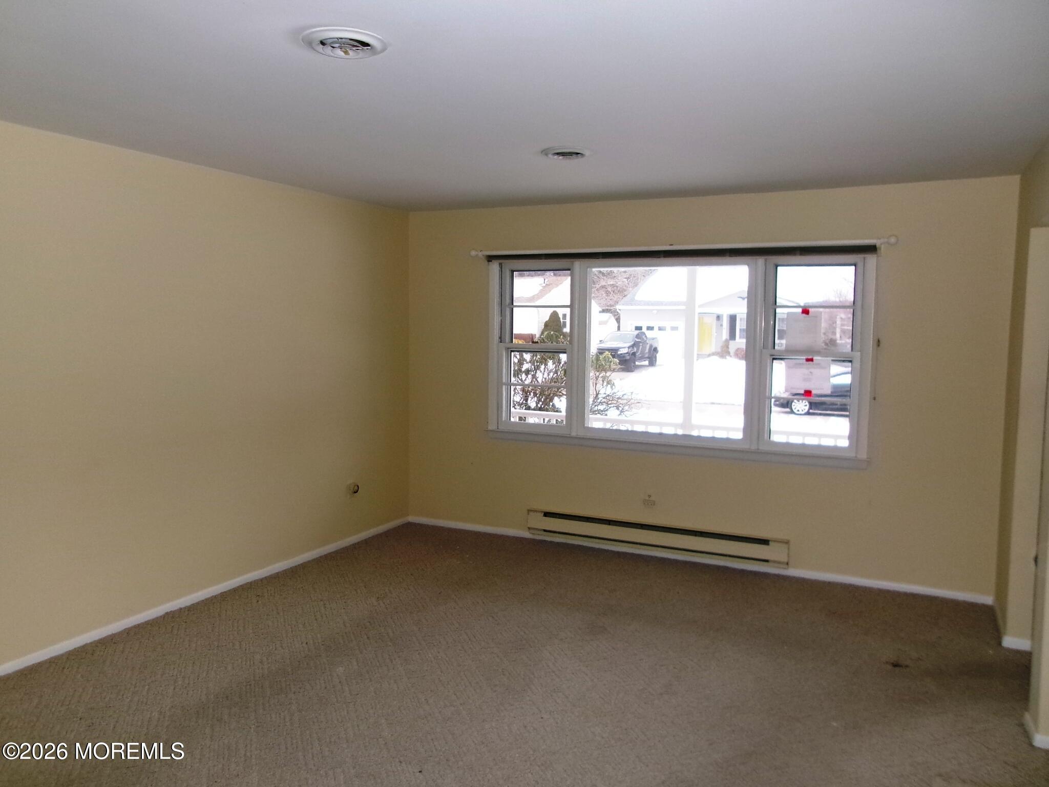 63 Eton Road Toms River, NJ 08757 - Photo 19 of 23 an empty room with a window