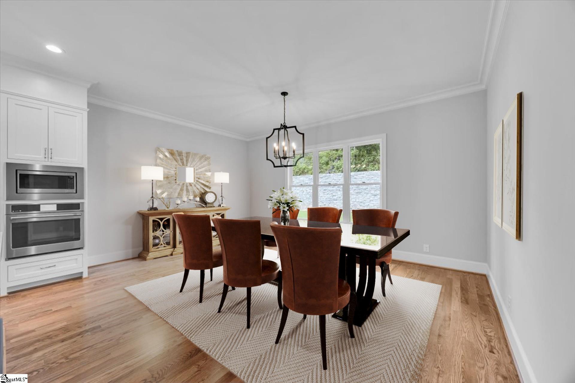 202 Chestnut Pond Lane Simpsonville, SC 29681 - Photo 18 of 50 18 x 12.5 dining area. Open to the kitchen with center island