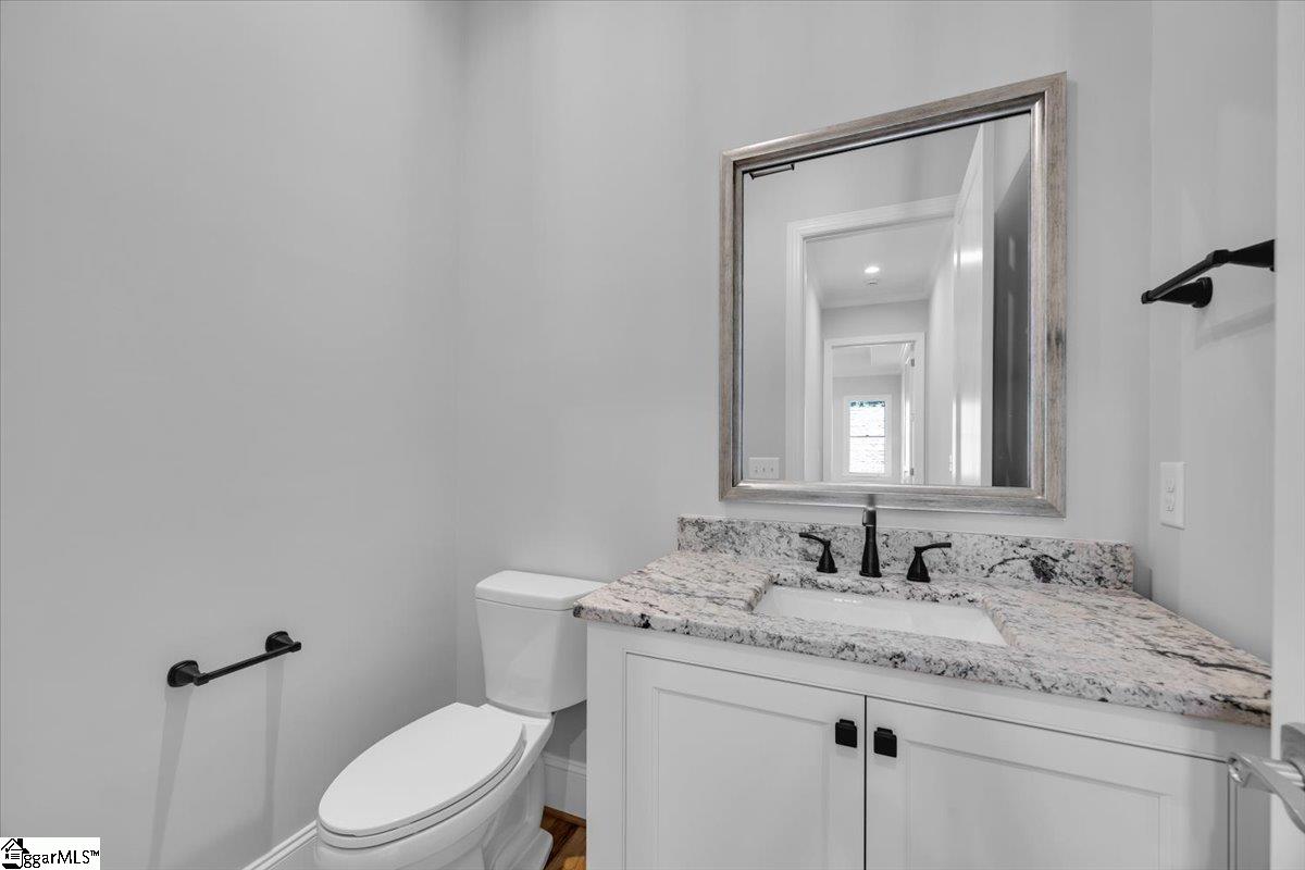 202 Chestnut Pond Lane Simpsonville, SC 29681 - Photo 25 of 50 Powder room is beautiful with custom vanity with leathered granite counter top