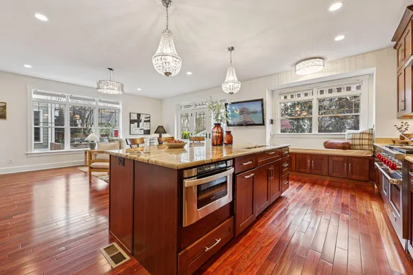 a bath tub sitting next to a window