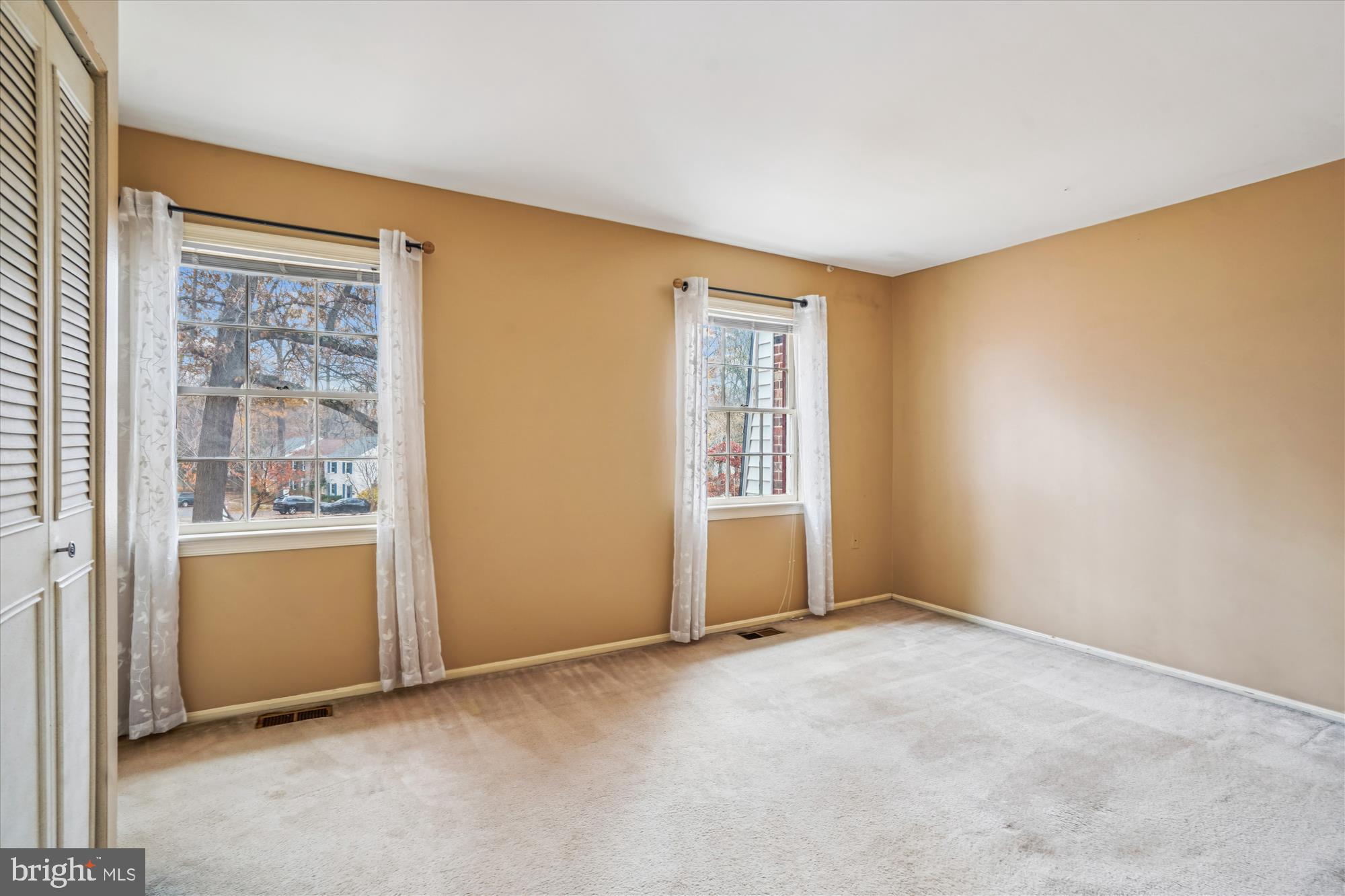 880 Azalea Drive, Unit 22880 Rockville, MD 20850 - Photo 13 of 39 a view of an empty room with a window
