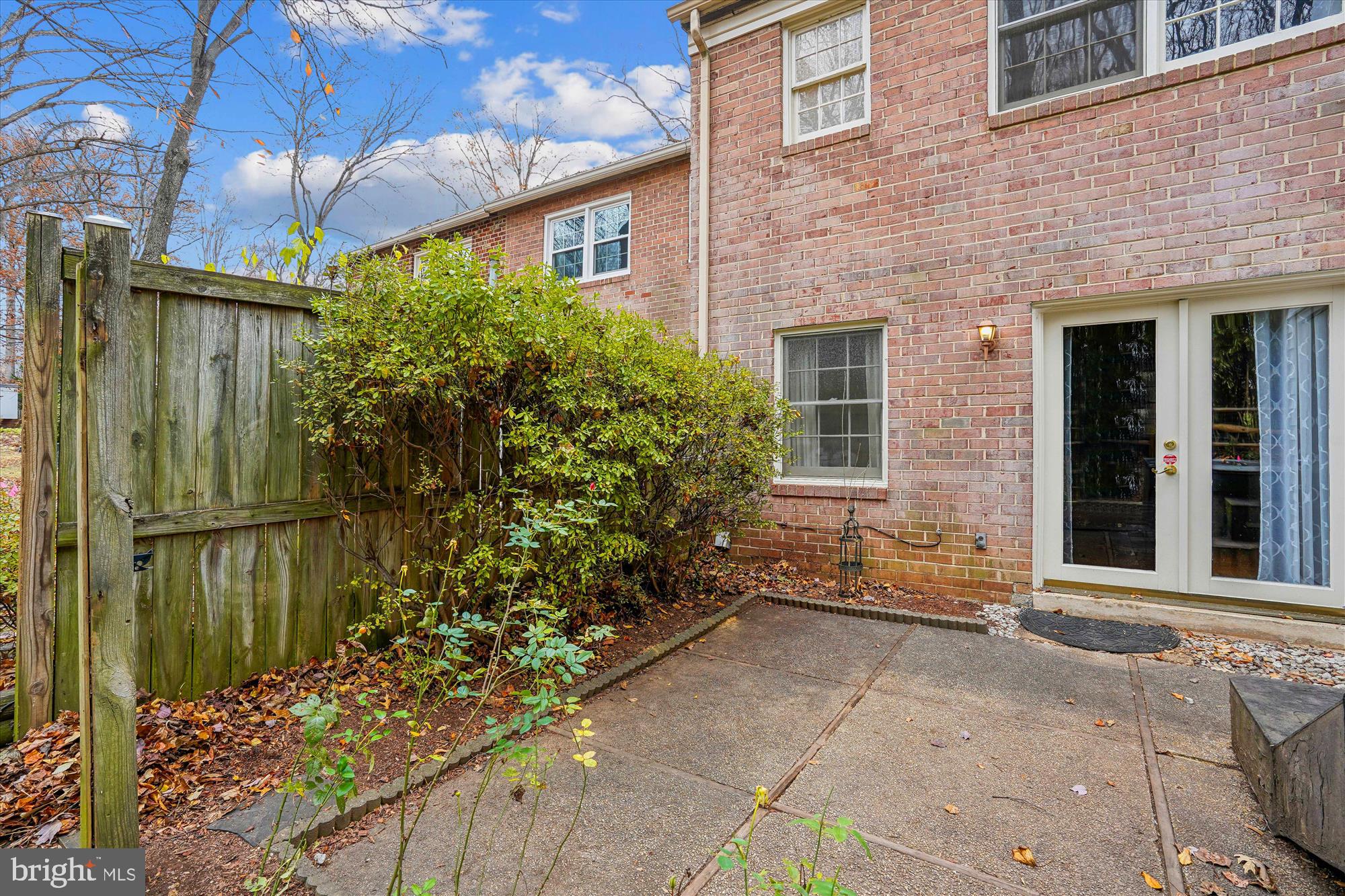 880 Azalea Drive, Unit 22880 Rockville, MD 20850 - Photo 18 of 39 a view of a house with a backyard