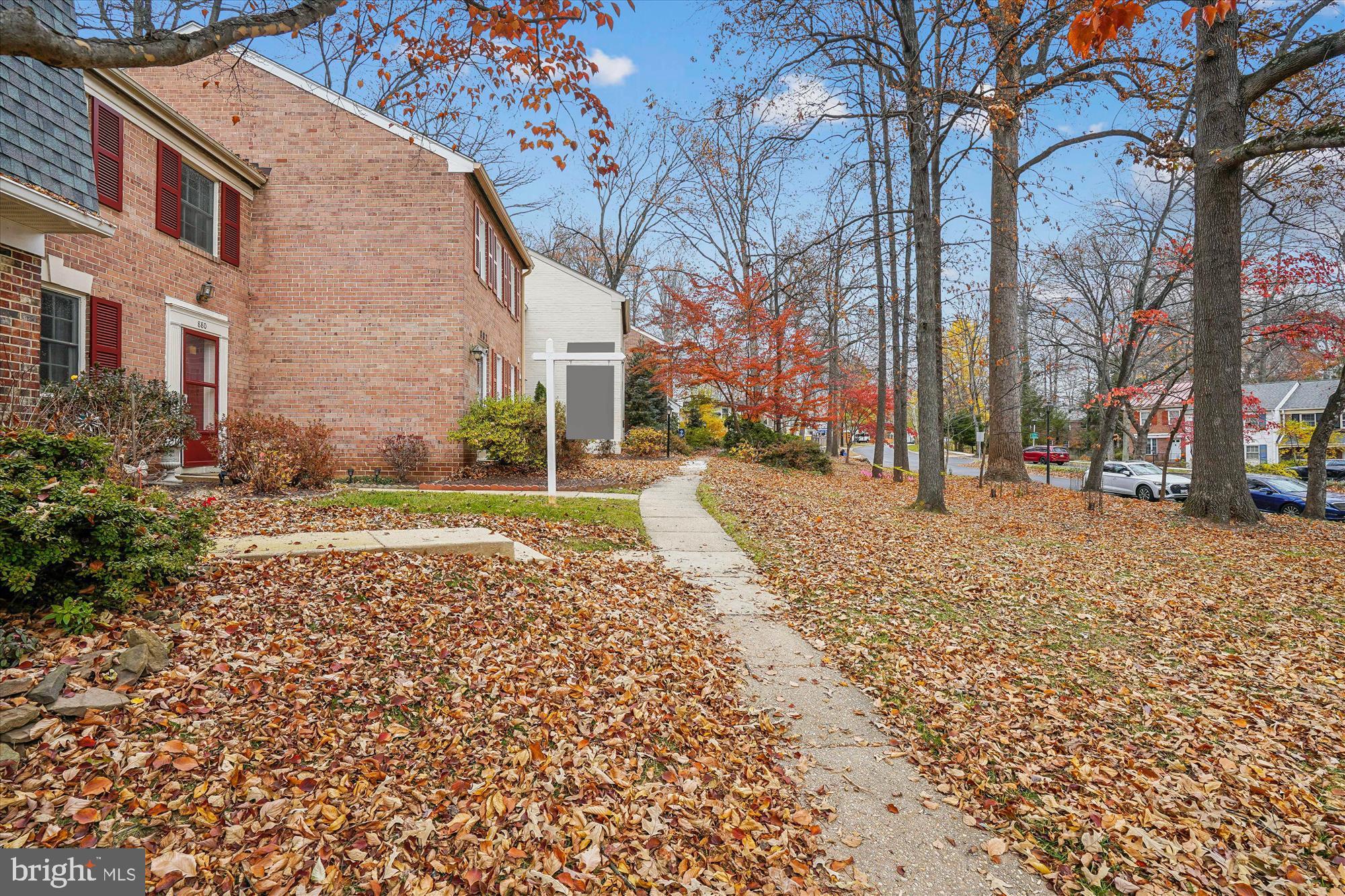 880 Azalea Drive, Unit 22880 Rockville, MD 20850 - Photo 3 of 39 a pathway of a house with a yard
