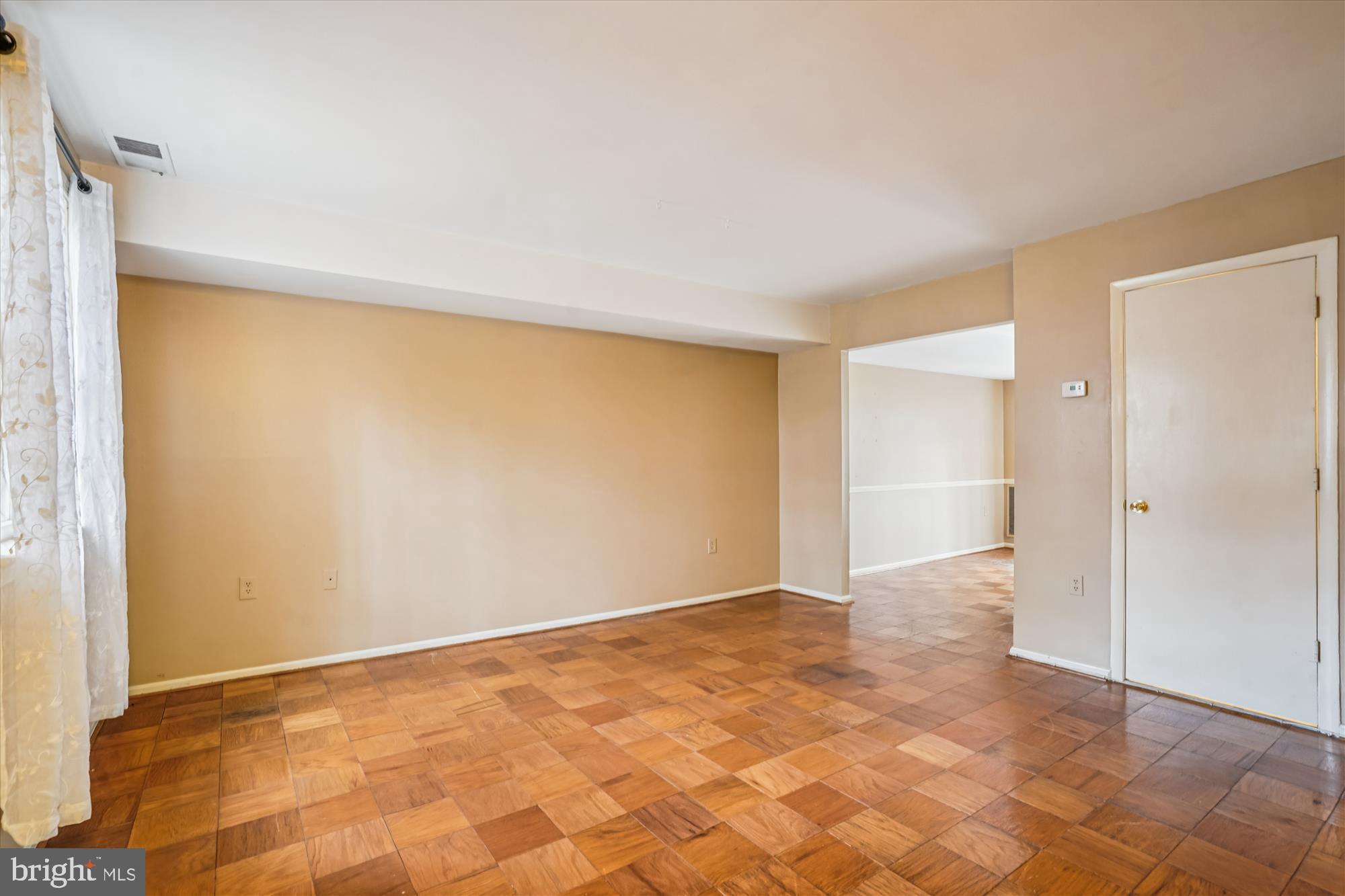 880 Azalea Drive, Unit 22880 Rockville, MD 20850 - Photo 5 of 39 a view of an empty room and window