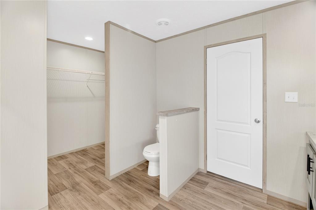 5570 Northeast 76th Avenue High Springs, FL 32643 - Photo 15 of 31 a bathroom with a sink and a toilet